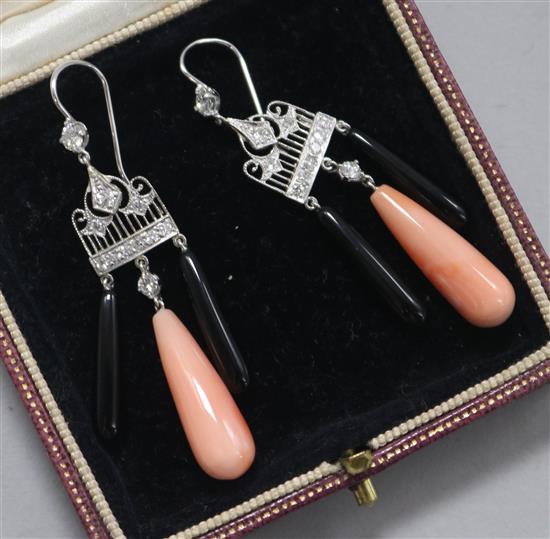 A pair of 1920s style platinum and white gold, diamond, coral and black onyx drop earrings,